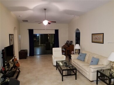 Large living room overlooks pond