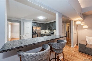 Kitchen featuring stainless steel appliances, back