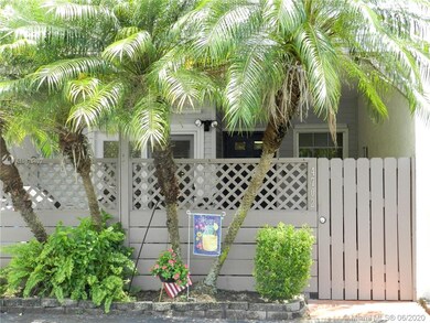 Gated entry into front private courtyard
