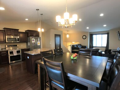 Dining to kitchen and living room