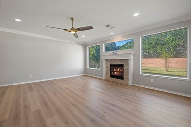 The herringbone tile carries into the kitchen back
