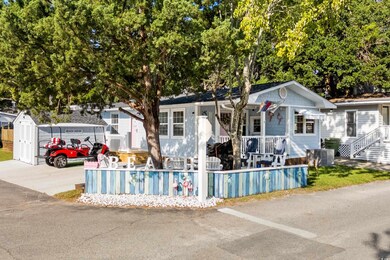 View of front of property with cooling unit and a 
