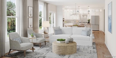 Living room featuring light wood-style flooring and a chandelier