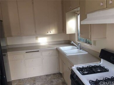 Alternate view of kitchen.