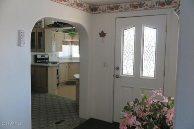 178 front entry and view to kitchen and