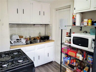 Updated kitchen in unit two - all appliances stay.