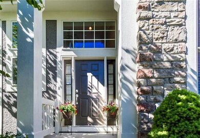 Enter the home through the delightful 2-story cove