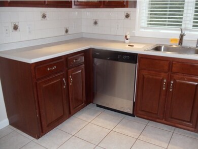GLASS FRONT CHERRY CABINETS