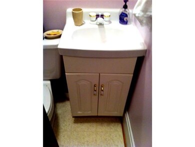 Bathroom Half bath is downstairs at side door entr