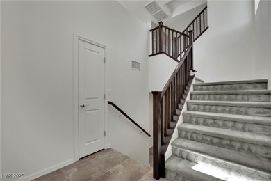 *Foyer showing split staircases going down to firs