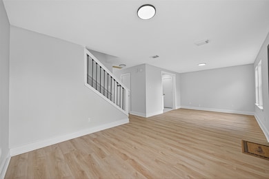Alternate view of your living room. Half bath located in between both living areas.