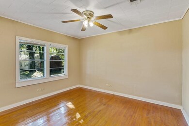 Bedroom:  Refinished wood floors, ceiling fan, nat