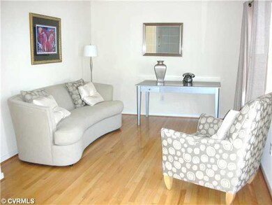 Living Room - Formal living room has hardwood floo