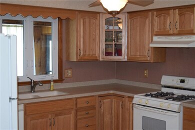 Updated Kitchen with Oak Cabinets and Quartz Count
