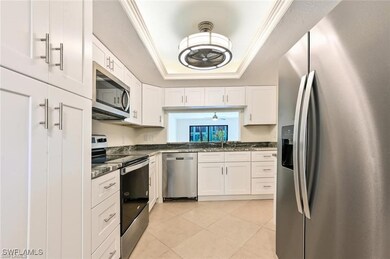 Kitchen featuring appliances with stainless steel