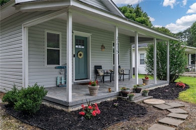 Property entrance featuring a porch