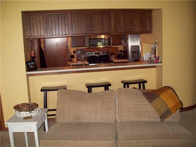 Great Room. There is a passthrough between the kitchen and Great Room.