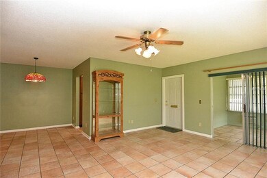 Living Room - dining room to the left, enclosed Fl