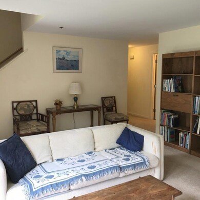 Entry into living room, hall leads...