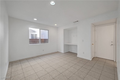 Spare room featuring recessed lighting, visible ve