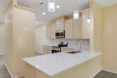 Kitchen featuring appliances with stainless steel