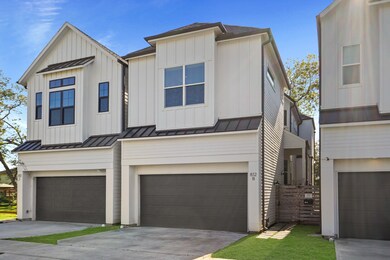 Detached home with view of entry and privacy fence