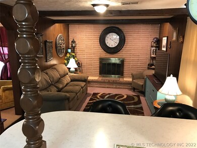 Den area with fireplace