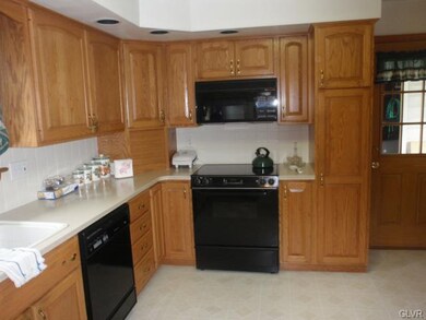 Updated kitchen with Corian counters, dishwasher, 