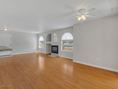Unfurnished living room with light wood-style floo