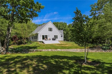Rear view of house shows the 216 sq...