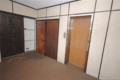 Lobby with Elevator and Storage room
