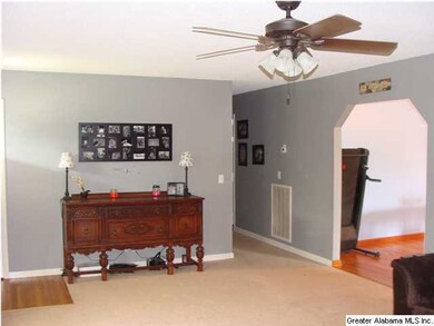 STANDING IN ONE CORNER OF THE GREAT ROOM LOOKING T