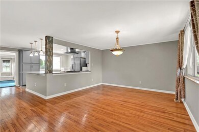 Dining room with original hardwood floors.