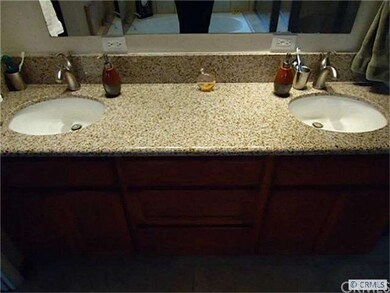 Master bath with double sink and counter tops