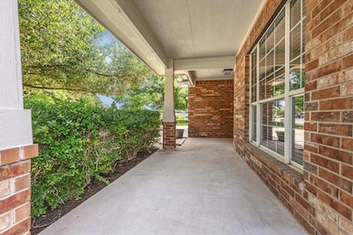 View of patio with a porch