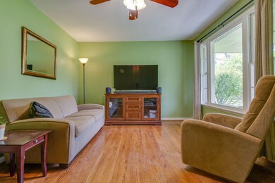 The large formal living room provides the perfect place to entertain, watch a movie, or just relax for a while.