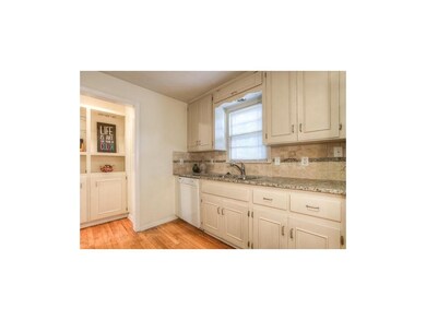 Kitchen updates include new granite and backsplash