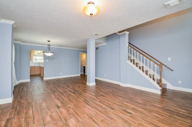 This spacious formal living and dining area featur