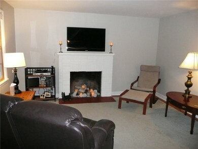 COZY LOG BURNING FIREPLACE WITH GAS LINE