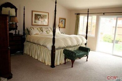 Master Bedroom with sliding doors to patio.