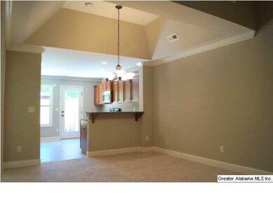 Dining Room with vaulted ceiling