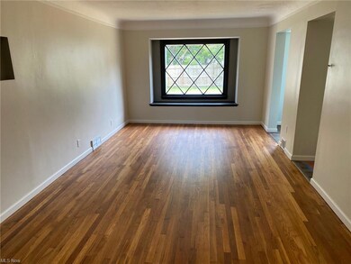 Living room/dining room with view of back yard