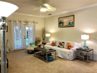 Living Room with French doors to screened lanai