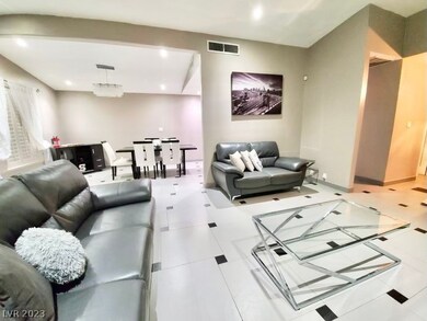 The entire home has designer ceramic tile flooring