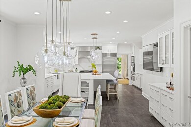 This brick colonial features a chef's kitchen with