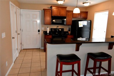 Granite counters, tiled floors and upgraded applia