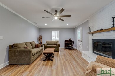 Renovated family room with new LPV floors, wood-bu
