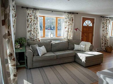 Living Room. The large bow windows &...