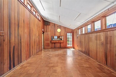 Looking from the den, this view is of the living r