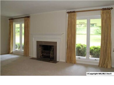 Additional view of living with fireplace